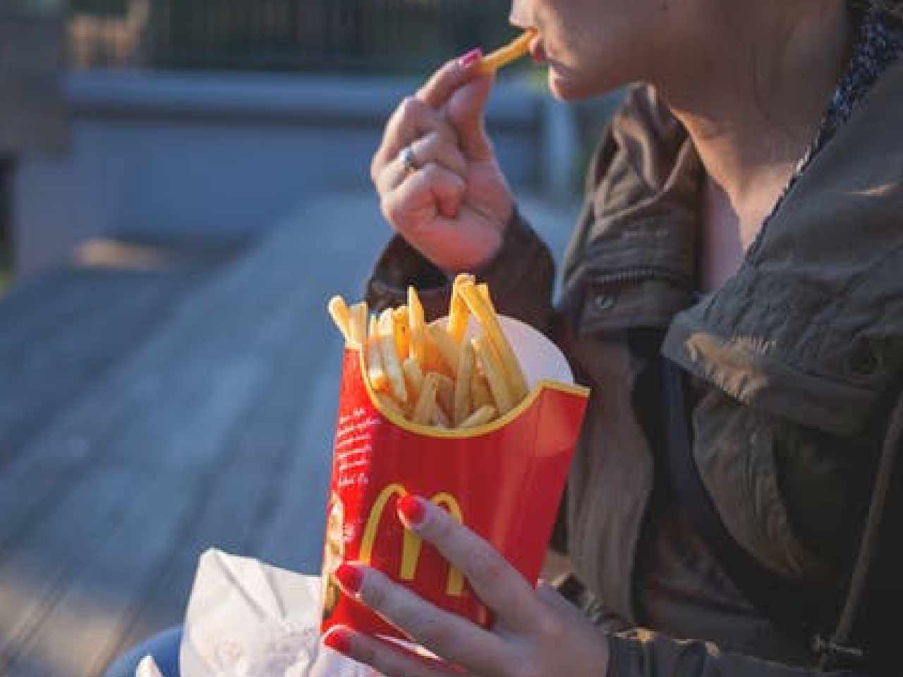 girl eating macdonalds fries
